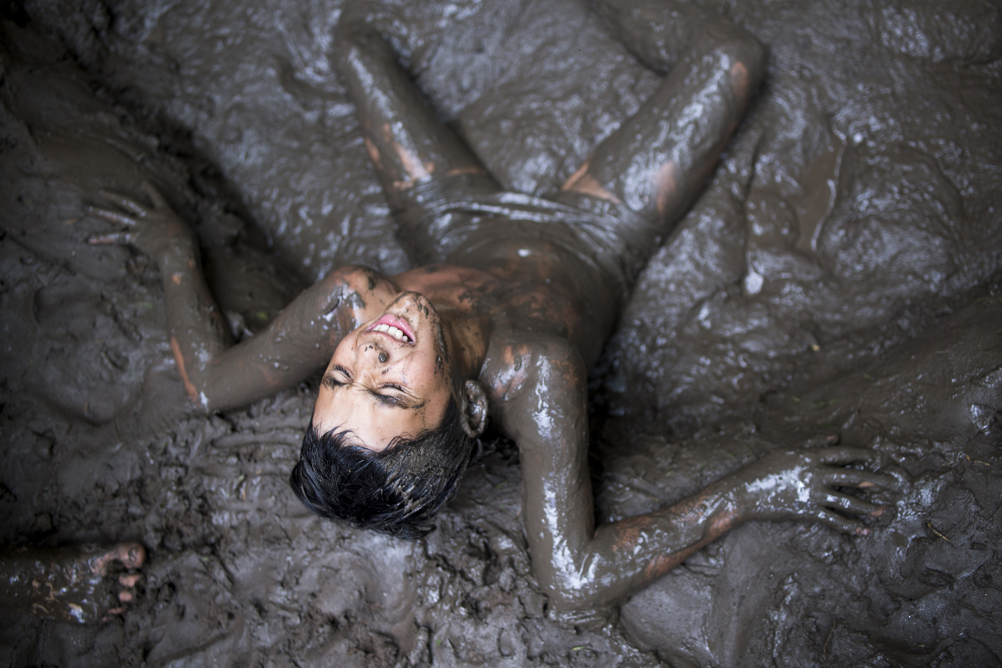 Julian exhausted during a mud fight. Last boy camp of the Gymnasium School.